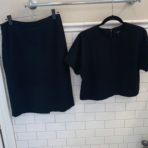 J. Crew black suiting set. Top with keyhole neckline. Pencil skirt.